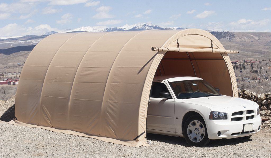 Tension fabric carport with car