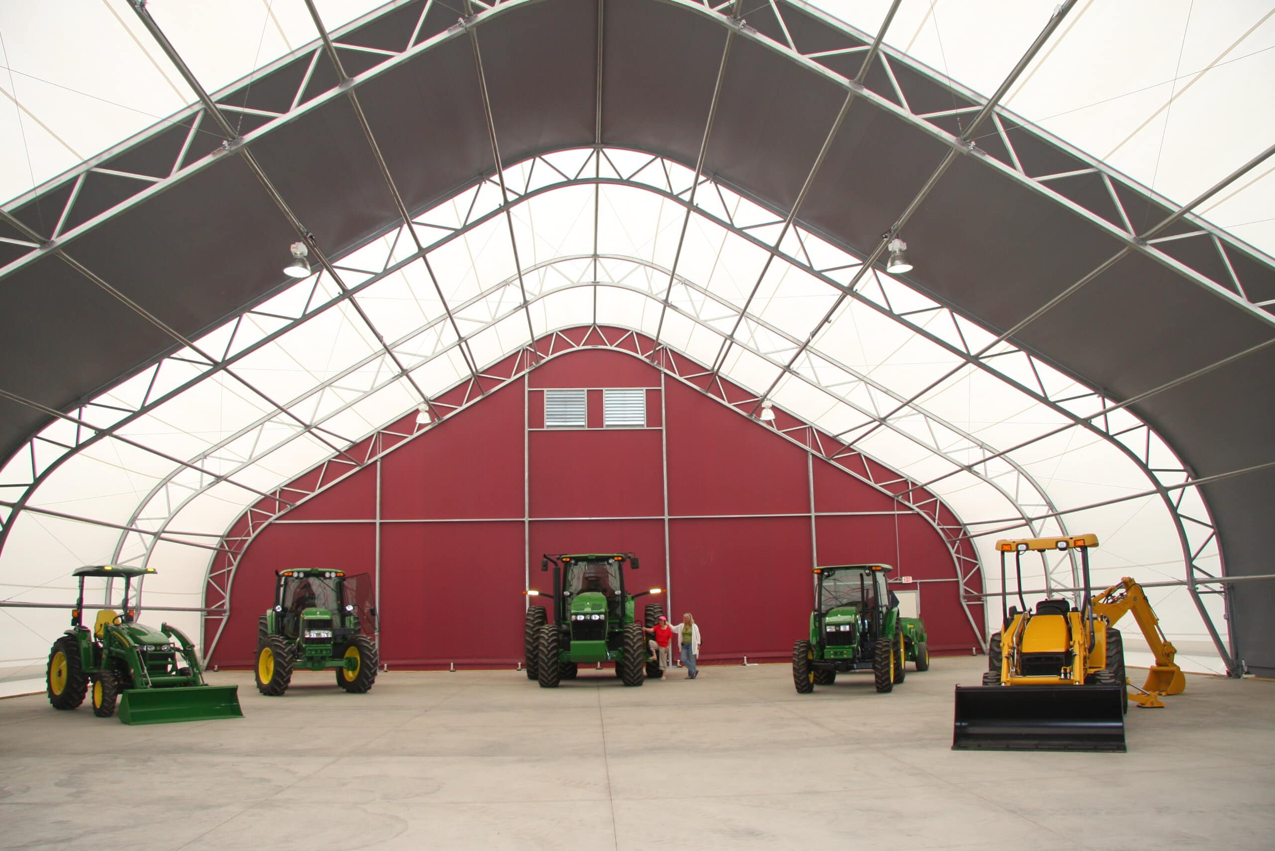 farm equipment in large fabric structure
