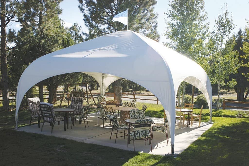 Large canopy covering a backyard patio