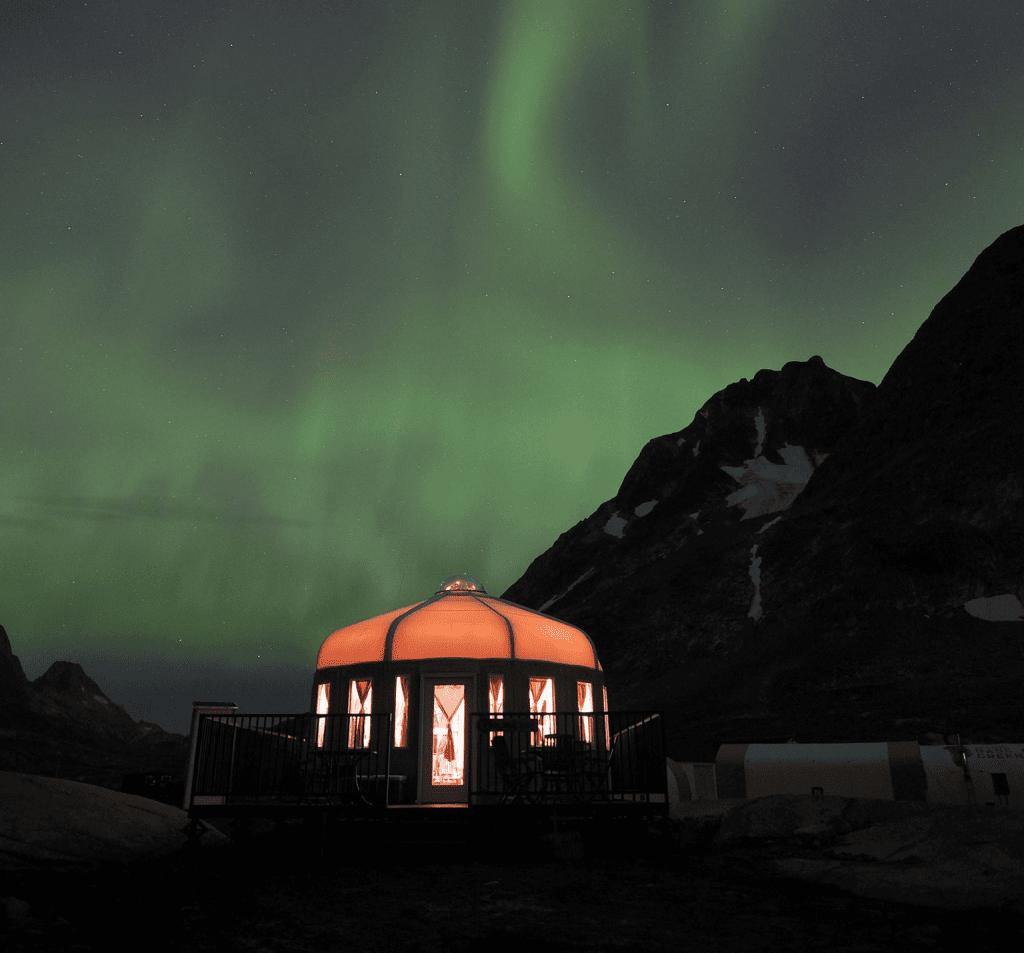 luxury yurt under northern lights